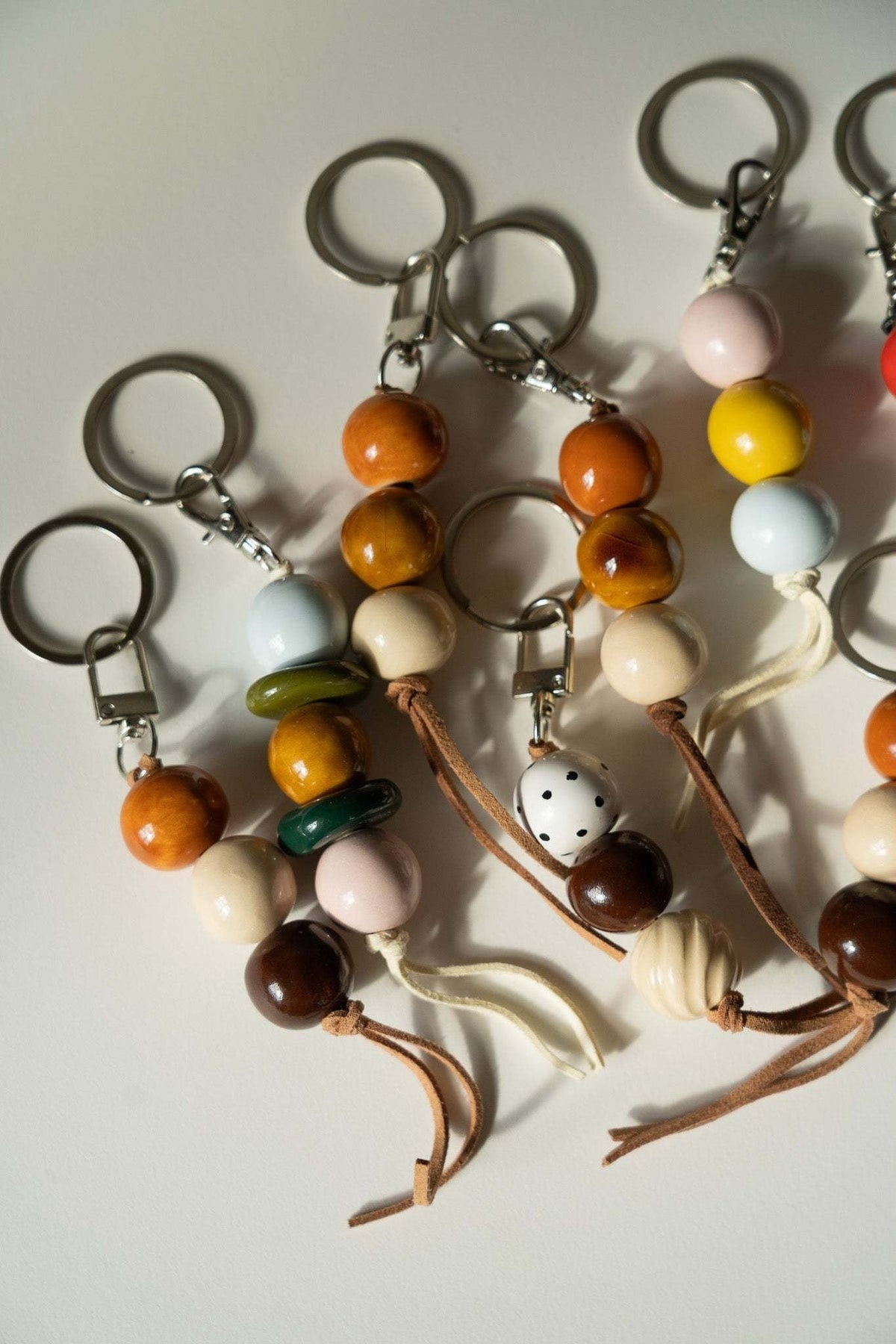 Handmade Ceramic Keychain with Dark Brown Beads