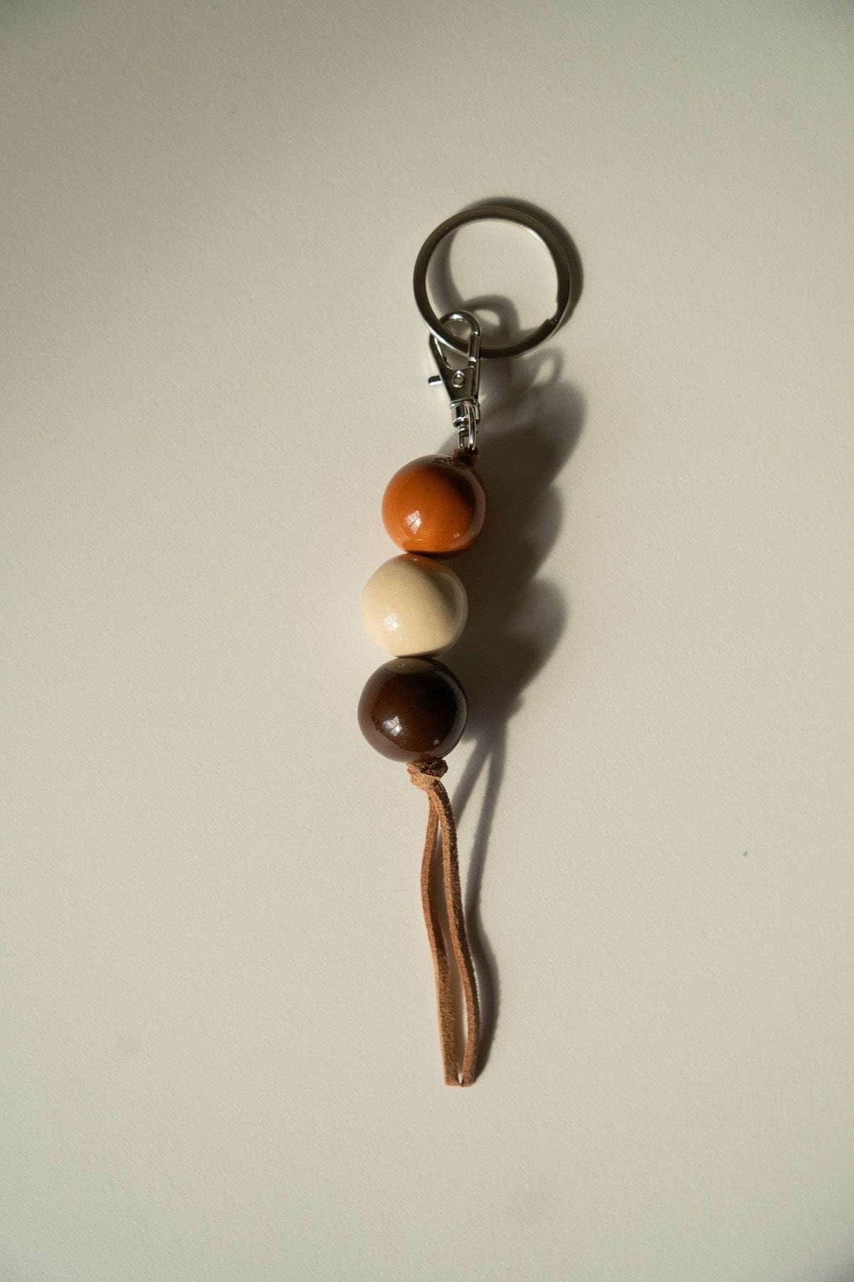Handmade Ceramic Keychain with Dark Brown Beads